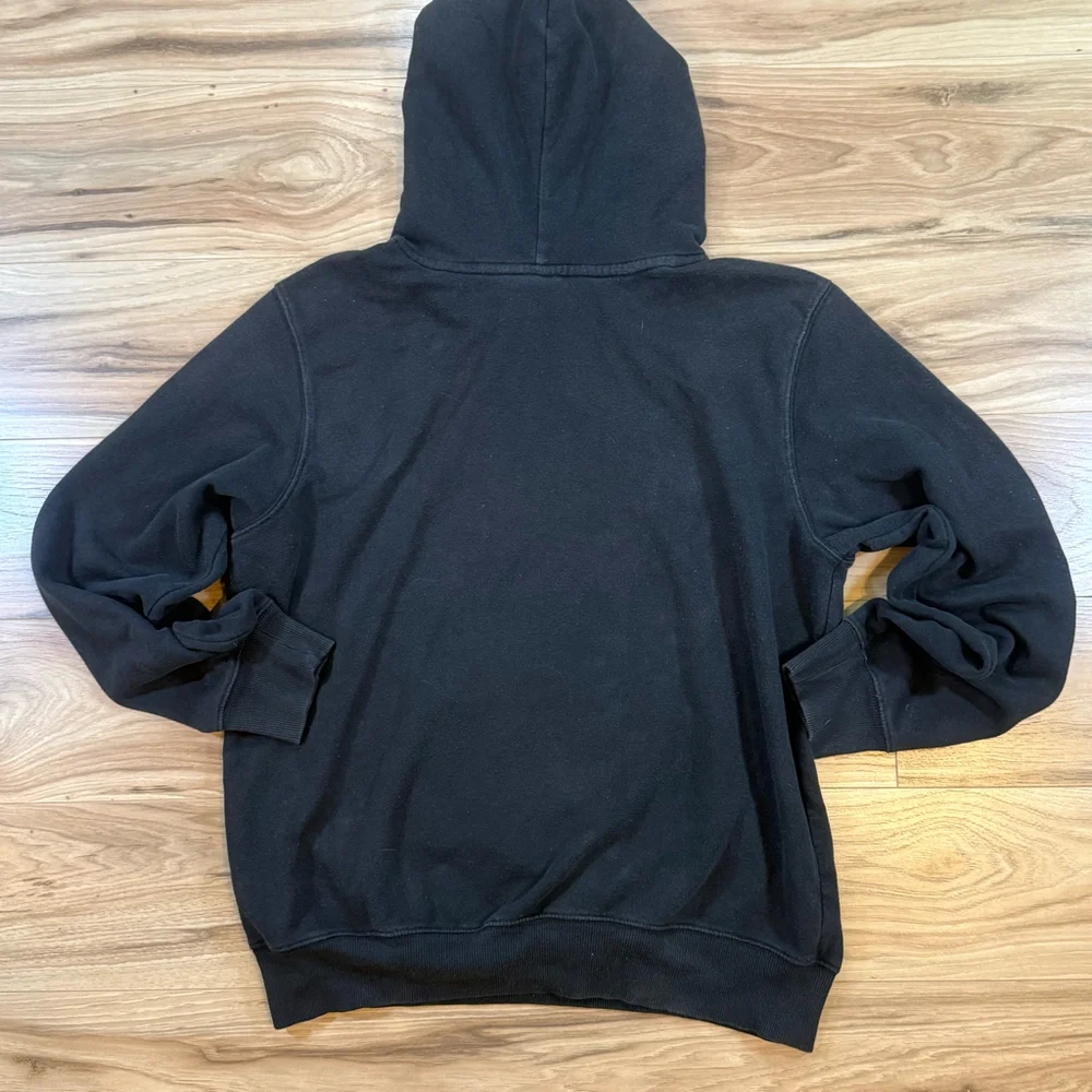 The North Face Black Hoodie with Red Logo Patch